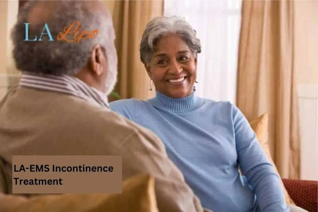 Couple sat smiling at each other - LA-EMS treatment Gloucester