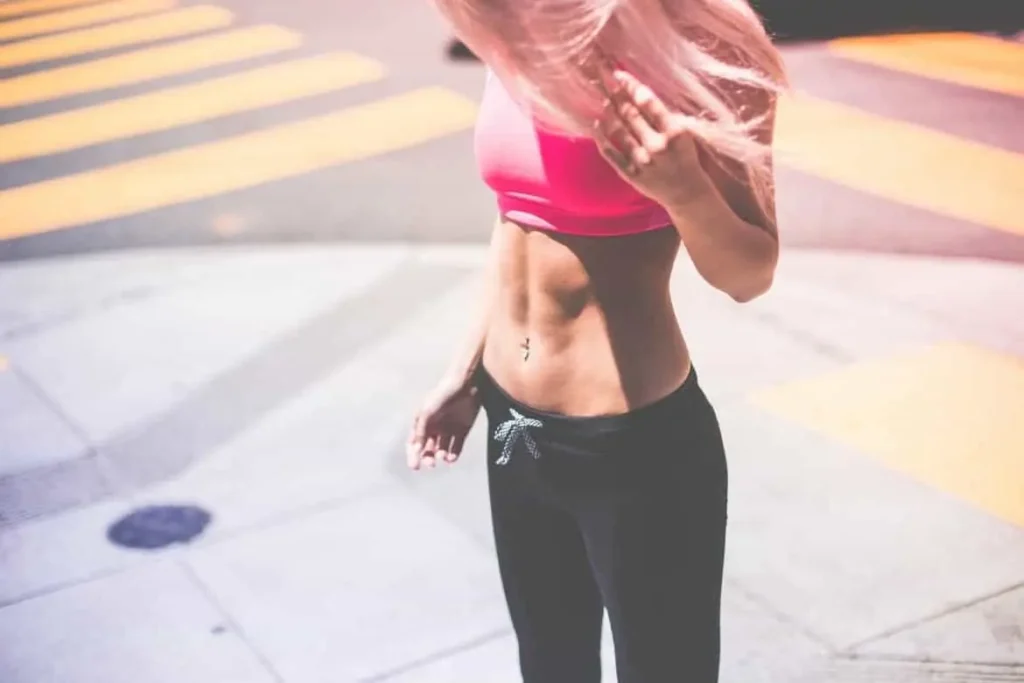 Woman with toned stomach after LA-EMS Body Sculpting Treatment Gloucester 