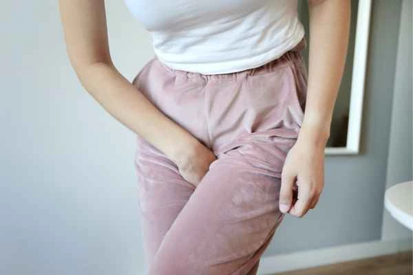 woman running for the toilet because of urinary incontinence Gloucester